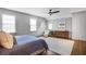 Relaxing main bedroom features a large bed, neutral walls, and natural light at 219 Little John Ne Trl, Atlanta, GA 30309