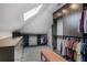 Well-organized walk-in closet with custom shelving, drawers, and ample storage space at 219 Little John Ne Trl, Atlanta, GA 30309