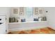 Cozy window seat with soft pillows and charming bird artwork on the wall at 219 Little John Ne Trl, Atlanta, GA 30309