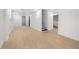 Spacious basement with new light wood flooring and stairs to the upper level at 2277 Cloverdale Se Dr, Atlanta, GA 30316