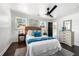 Bright and airy main bedroom with hardwood floors and large windows at 2277 Cloverdale Se Dr, Atlanta, GA 30316