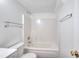 Bathroom featuring a tub and shower combination at 6502 Wellington Chase Ct, Lithonia, GA 30058