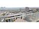 Enjoy the cityscape from this balcony view, showcasing urban skyline and lush green treetops at 3338 Peachtree Ne Rd # 2701, Atlanta, GA 30326