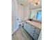 Modern bathroom featuring granite countertops, sleek cabinetry, and contemporary fixtures at 3338 Peachtree Ne Rd # 2701, Atlanta, GA 30326