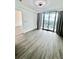 Spacious bedroom with balcony access, offering natural light and city views at 3338 Peachtree Ne Rd # 2701, Atlanta, GA 30326