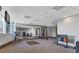 Bright exercise room with large mirror, punching bags, flat screen TV, and weight rack at 3338 Peachtree Ne Rd # 2701, Atlanta, GA 30326