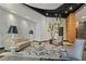 Modern lobby with comfortable seating, decorative lighting, artful wall accents and black ceiling at 3338 Peachtree Ne Rd # 2701, Atlanta, GA 30326