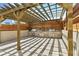 Outdoor kitchen under wooden pergola with built-in grill and counter space at 3338 Peachtree Ne Rd # 2701, Atlanta, GA 30326