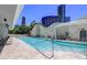 Modern outdoor pool with lounge chairs and views of city skyline at 3338 Peachtree Ne Rd # 2701, Atlanta, GA 30326