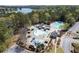 Aerial view featuring the neighborhood swimming pool, water slide, splashpad and surrounding amenities at 840 Stonehaven Ln, Alpharetta, GA 30005