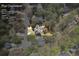Aerial view of a home on a 0.37 acre lot with a yard and proximity to surrounding neighborhood at 840 Stonehaven Ln, Alpharetta, GA 30005