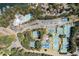 Aerial view highlighting community amenities, including swimming pool, clubhouse, and tennis courts at 840 Stonehaven Ln, Alpharetta, GA 30005