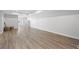 Finished basement with neutral paint, light colored floors, and great lighting at 840 Stonehaven Ln, Alpharetta, GA 30005