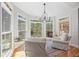 Cozy breakfast nook featuring large windows with views of the backyard at 840 Stonehaven Ln, Alpharetta, GA 30005
