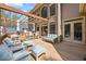 Sunny deck with outdoor seating, dining area, and a pergola, perfect for entertaining at 840 Stonehaven Ln, Alpharetta, GA 30005