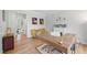 Stylish office with decor, hardwood flooring, accent furniture and art at 840 Stonehaven Ln, Alpharetta, GA 30005