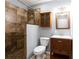 Bathroom featuring tiled shower, vanity, and framed mirror, offering a functional and stylish design at 1924 Sweet Flag Rd, Lawrenceville, GA 30045