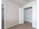 Bedroom closet featuring shelving for storage with a view into the connecting room at 1924 Sweet Flag Rd, Lawrenceville, GA 30045