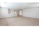 Spacious bonus room featuring plush carpets, recessed lighting and neutral walls at 1924 Sweet Flag Rd, Lawrenceville, GA 30045