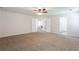 Bright, massive bonus room includes doorways to bedrooms and bathrooms for easy access and a sense of community at 1924 Sweet Flag Rd, Lawrenceville, GA 30045