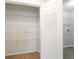 Walk-in closet features adjustable shelving for easy storage solutions at 1924 Sweet Flag Rd, Lawrenceville, GA 30045