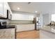 Kitchen features stainless steel appliances, granite countertops, and white cabinetry at 1924 Sweet Flag Rd, Lawrenceville, GA 30045