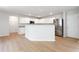 Beautiful kitchen featuring stainless steel appliances, hardwood floors, and plenty of storage at 1924 Sweet Flag Rd, Lawrenceville, GA 30045