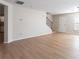 Inviting living room featuring wood floors and staircase at 1924 Sweet Flag Rd, Lawrenceville, GA 30045