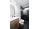 Stylish bathroom with black and white tile and modern finishes at 3128 Cedar St, Scottdale, GA 30079