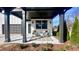 Inviting covered porch with stylish seating area, perfect for relaxing outdoors at 3128 Cedar St, Scottdale, GA 30079
