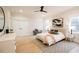 Main bedroom features neutral tones, a ceiling fan, natural light, and a calm, relaxing atmosphere at 3128 Cedar St, Scottdale, GA 30079