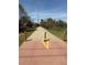 Well-maintained walkway featuring striped bollards, enhancing safety and visibility at 3128 Cedar St, Scottdale, GA 30079