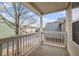 Enjoy the outdoors from this balcony with railings and a view of neighborhood homes at 5125 Cactus Cove Ln, Buford, GA 30519
