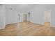 Bright living room with neutral walls and laminate flooring throughout the space at 5125 Cactus Cove Ln, Buford, GA 30519