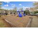 Community playground featuring slides and climbing structures for  at 5125 Cactus Cove Ln, Buford, GA 30519