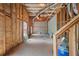 Unfinished basement with wood framing and exposed insulation at 7040 Magnolia Park Ln, Norcross, GA 30093