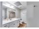 Bathroom featuring a vanity with a sink, mirror, toilet, and shower at 2006 Hubbard Ct, Villa Rica, GA 30180