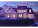 Inviting two-story home with brick and siding exterior, manicured landscaping, and inviting walkway at 2006 Hubbard Ct, Villa Rica, GA 30180