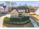 Charming two-story home with a well-manicured lawn and mature trees at 2006 Hubbard Ct, Villa Rica, GA 30180