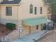 Exterior view of the home with a covered parking area and green awning at 2006 Hubbard Ct, Villa Rica, GA 30180