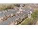 An aerial view of upscale neighborhood townhomes showcases luxurious living and community ambiance at 2620 Milford Ln, Alpharetta, GA 30009