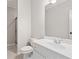 Bathroom featuring a toilet, vanity with sink and a tiled shower stall at 2620 Milford Ln, Alpharetta, GA 30009