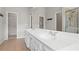 Bathroom with a double-sink vanity and tile flooring at 2620 Milford Ln, Alpharetta, GA 30009