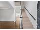 Bright foyer showcasing staircase, hardwood floors, elegant moldings and great natural light at 2620 Milford Ln, Alpharetta, GA 30009