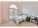 Cozy bedroom with large window and a dedicated study area at 3075 Superior Dr, Dacula, GA 30019