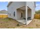 Outdoor patio with furniture set and view to the backyard and siding at 804 Trestle Creek Ct, Temple, GA 30179