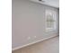 Bedroom featuring a neutral wall and soft carpet at 804 Trestle Creek Ct, Temple, GA 30179