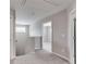 Upstairs hallway featuring neutral walls and soft carpet at 804 Trestle Creek Ct, Temple, GA 30179