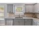 Close up shot of the kitchen with stainless steel appliances and lots of light at 804 Trestle Creek Ct, Temple, GA 30179