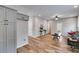 Open-concept living room featuring hardwood floors and neutral paint tones at 804 Trestle Creek Ct, Temple, GA 30179